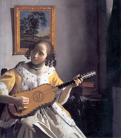 Young Woman Playing a Guitar Vermeer
